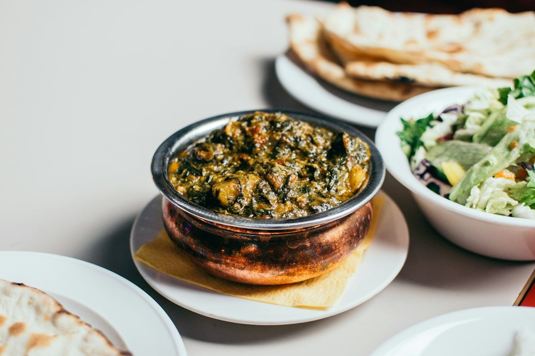 Illustrative stock photograph of aloo palak, spinach and potato curry